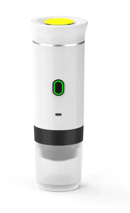 White portable capsule coffee machine with a minimalist design, green power indicator, and detachable water tank for coffee on-the-go.