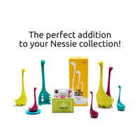 Cute Tea Infuser by OTOTO shaped like a green Nessie creature, part of a colorful Nessie kitchen gadget collection, perfect for loose leaf tea.