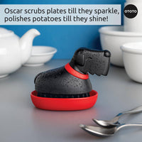 Oscar Dish Brush by Ototo packaged as a gift, ideal for dog lovers and clean freaks looking for a fun kitchen cleaning tool.