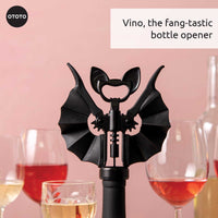 OTOTO Vino Spooky Bat Opener displayed among wine glasses. A fang-tastic bottle opener perfect for spooky-themed parties and wine lovers.