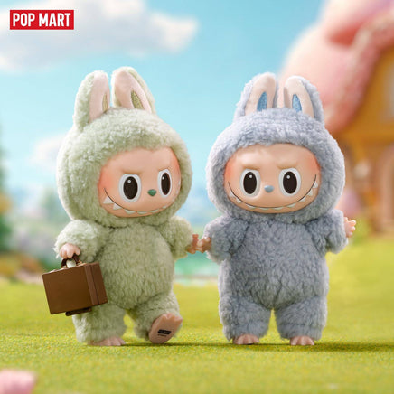 POP MART The Monsters Tasty Macarons Blind Box Figures featuring two fuzzy bunny-suit vinyl toys holding hands in a whimsical outdoor setting.