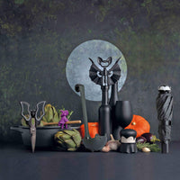 Halloween Bat Kitchen Scissors - OTOTO Elizabat Shears with bat-wing handles, styled among spooky kitchen gadgets and vegetables for festive prep.