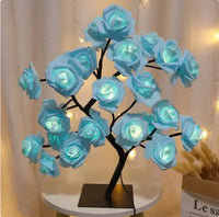 Romantic Rose Tree Lamp with glowing blue LED roses, perfect for adding a serene and romantic touch to bedroom decor.