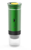 Green portable capsule coffee machine with a stylish design, green power indicator, and detachable water tank for coffee on-the-go.