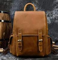 Light brown Crazy Horse leather men's retro backpack featuring buckle straps and a sturdy handle, perfect for casual or professional use.