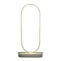 Modern oval LED table lamp with a sleek white base and soft glowing light, ideal for contemporary home or office decor.