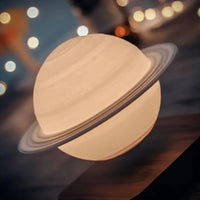 Close-up of a levitating Saturn lamp with glowing rings, enhancing the celestial aesthetic in a cozy setting.