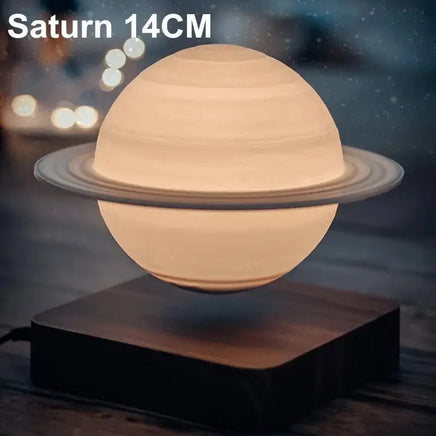 Levitating Saturn lamp glowing warmly with detailed rings, creating a celestial ambiance on a wooden base.