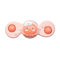 Pink baby spin toy featuring a cute octopus design and two rounded pink spinning points, perfect for babies' developmental play.