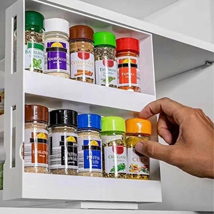 Double Layer Rotating Spice Rack in use, holding various spice jars with a hand accessing one, ideal for clutter-free kitchen storage.