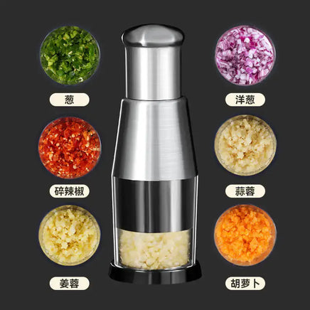 Garlic crusher and onion chopper displayed with various chopped vegetables, emphasizing its multifunctional kitchen use.