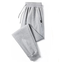 Crossfit Track Sweatpants in light gray with elastic waistband, drawstrings, and tapered cuffs, designed for gym and sportswear enthusiasts.