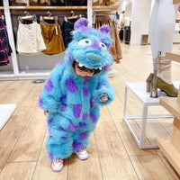 Child in fluffy animal jumpsuit