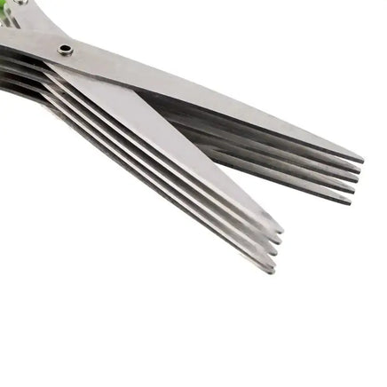 Close-up of stainless steel multi-layer blades of multifunctional green onion scissors, designed for precise herb and spice cutting.