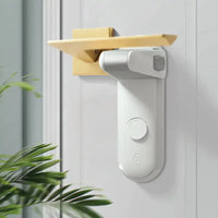 Safety Door Lever Lock in white, securely installed on a door lever, designed to prevent unauthorized access and ensure child safety.