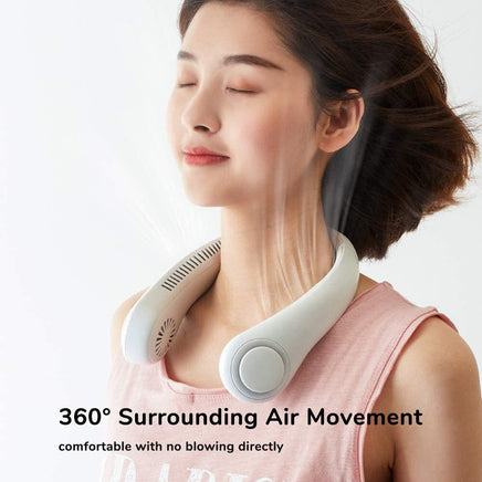 Woman wearing Mini Bladeless Neck Fan Outdoor with visible airflow, demonstrating 360° cooling and hands-free operation for outdoor comfort.