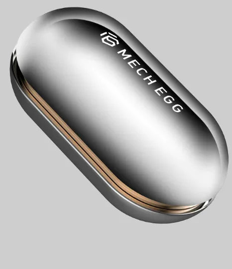 Silver metallic MechEgg coin stress relief toy with sleek oval shape, gold accents, and modern design for anxiety relief