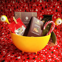 OTOTO Draining Basket for Kitchen used as a festive gift basket, showcasing its multifunctional and fun design for holiday kitchen decor.