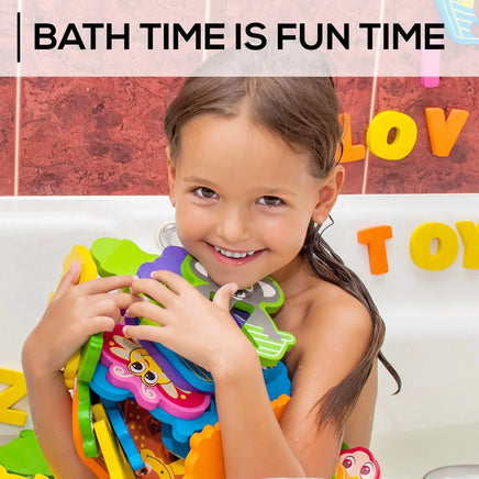 Smiling child holding colorful foam bath toys in a bathtub, emphasizing fun and educational bath time activities for kids.