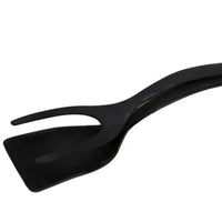 Black 2-in-1 kitchen gadget with a spatula and fork combination, designed for easy food handling and flipping.