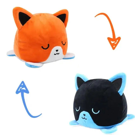 Orange and black fox double-sided plush toy with reversible sleepy expressions. Soft and adorable from Shop Name.