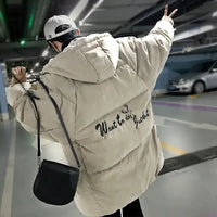 Men's Winter Hooded Puffer Jacket in beige with 'Want to do Just do it' text, oversized Korean-style design for trendy winterwear.