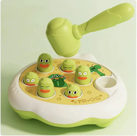 Groundhog Educational Toy with a green frog theme, including a hammer and pop-up frog figures on a sturdy plastic base.