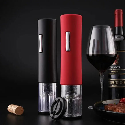 Red and black electric wine openers displayed with wine and glass, showcasing stylish kitchen gadgets for wine enthusiasts.