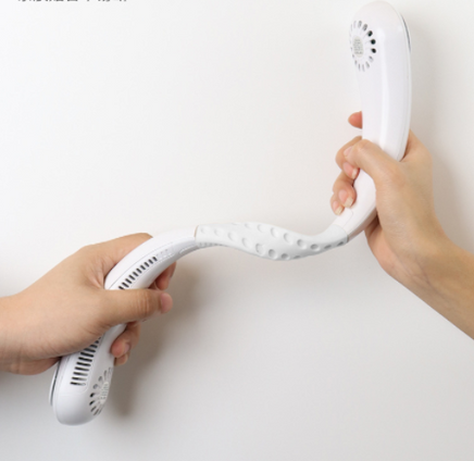 Flexible Mini Bladeless Neck Fan Outdoor being twisted to show its bendable, ergonomic structure for personalized comfort and durability.