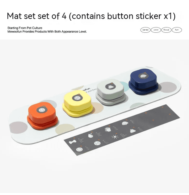 Set of four colorful pet chatter buttons in orange, yellow, gray, and blue with bone stickers, on a white display tray for dogs