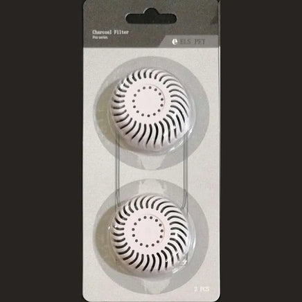 Charcoal filter replacement pack for pet water fountains, featuring two round filters with a spiral vent design in secure packaging.