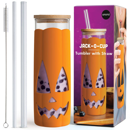 Halloween glass coffee tumbler with straw and lid featuring a pumpkin face design, perfect for spooky drinks like iced lattes or boba tea.