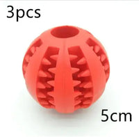 Red interactive rubber slow feeder dog ball, 5cm in size, sold in a 3-piece set for treat dispensing and chewing.