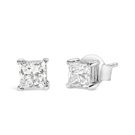 14K white gold princess cut lab-grown diamond solitaire stud earrings featuring F-G color and VS2-SI1 clarity. Elegant and timeless jewelry for any occasion.