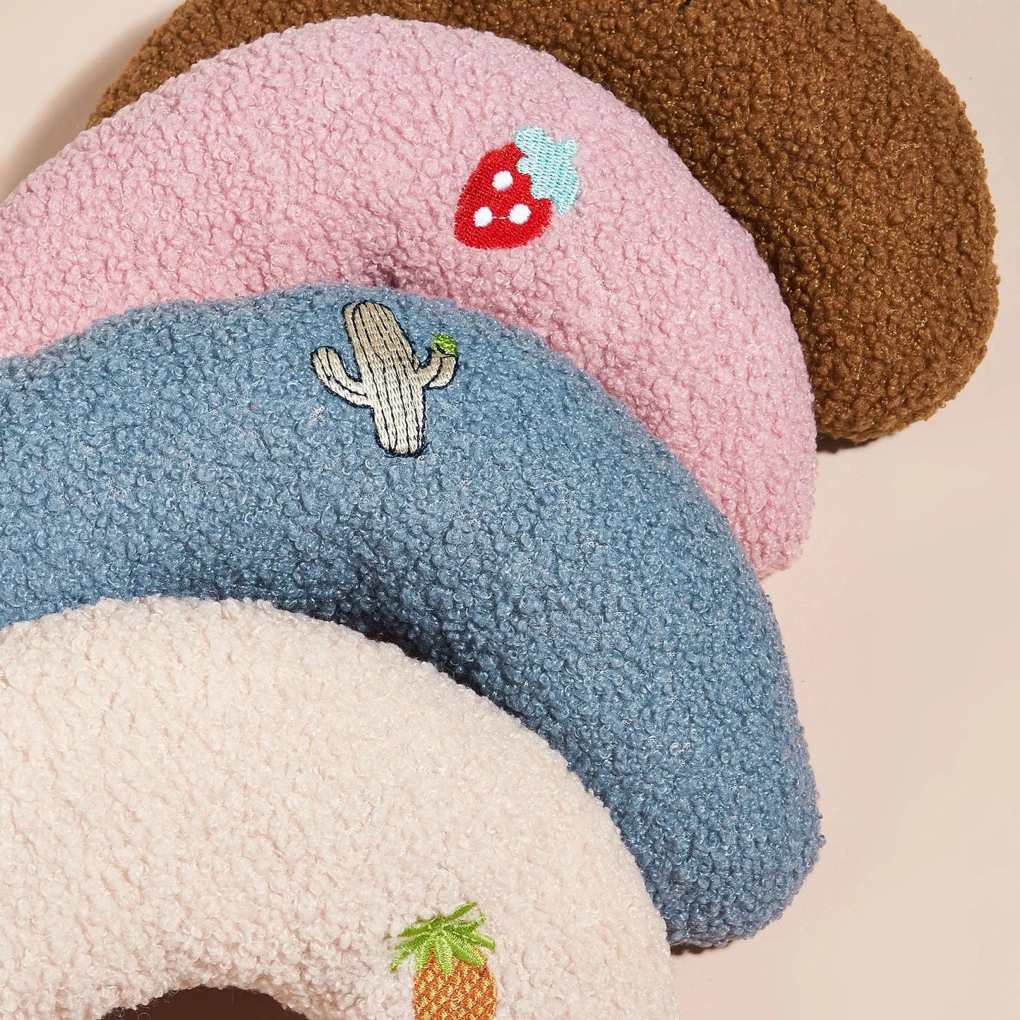 Colorful embroidered pet pillow with cactus design