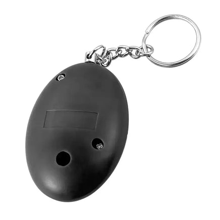 Back view of a black keychain emergency alarm with a keyring, highlighting its lightweight and ergonomic design.