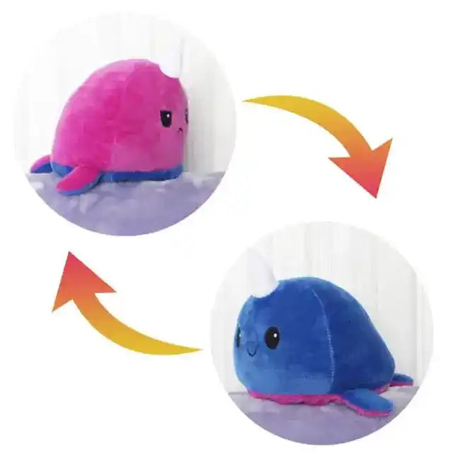 Pink and blue narwhal double-sided plush toy with reversible sad and happy expressions. Adorable and soft from Shop Name.