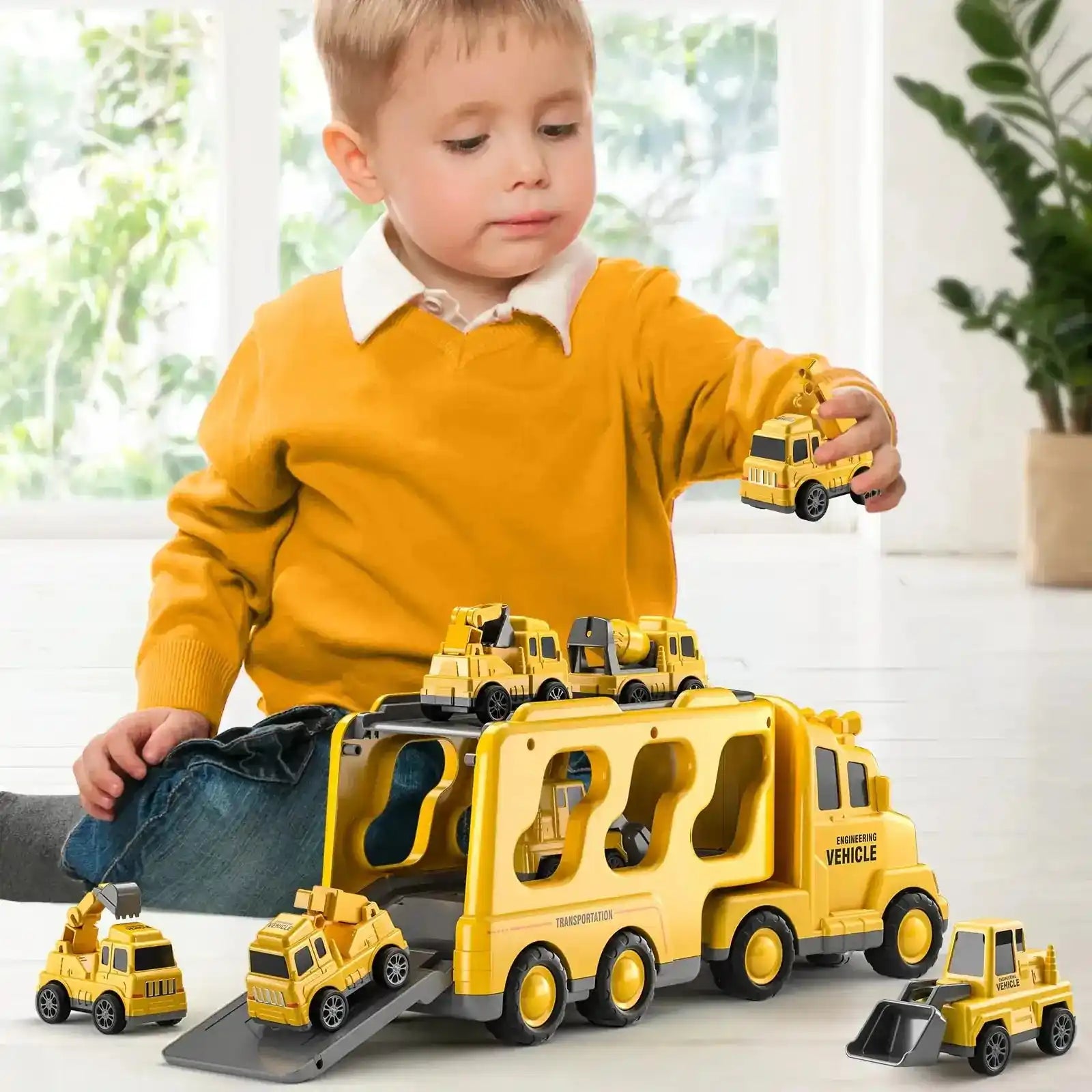 Child playing with a yellow engineering truck toy set. Includes multiple construction vehicles for creative play.