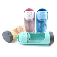 Assorted portable pet water bottle feeders in beige, red, blue, and green, featuring a compact design with a built-in bowl.