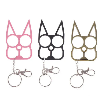 Three Portable Cute Cat Multifunction Outdoor Gadgets Keychains in pink, black, and gold displayed upright with attached key rings.