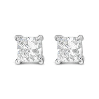 14K white gold princess cut lab-grown diamond solitaire stud earrings featuring F-G color and VS2-SI1 clarity. Elegant and sustainable jewelry option.