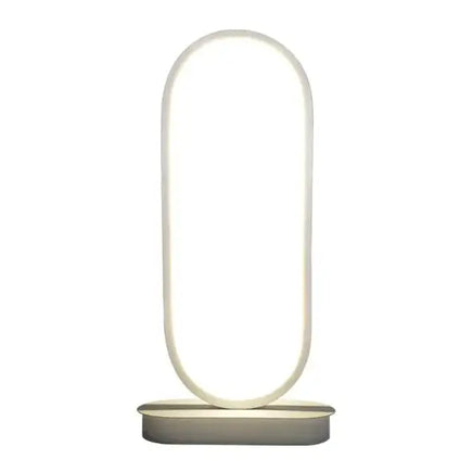 Modern oval LED table lamp with a sleek, minimalist design and a glowing oval-shaped light on a compact base, ideal for home or office decor.