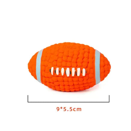 Bright orange squeaky dog toy shaped like a football, measuring 9x5.5 cm, designed for interactive pet play and entertainment.