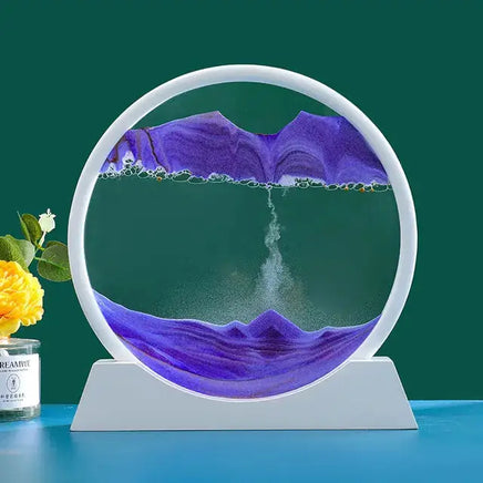 Moving Sand Art Picture Frame featuring dynamic purple sand creating mesmerizing landscapes in a circular frame with a white base.