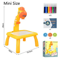 Mini-sized Kids Art Table Set with a yellow giraffe projector, markers, stencil discs, an art booklet, and colorful packaging.