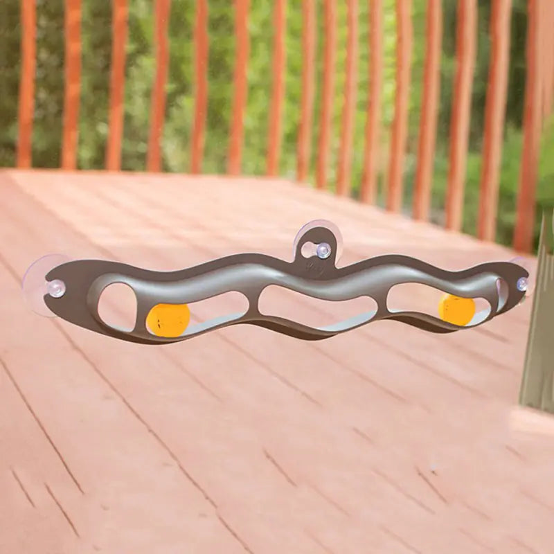 Suction cup window track ball cat toy for feline play