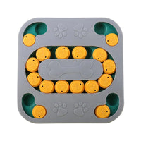 Gray and yellow dog puzzle toy with paw print details and treat hiding compartments, ideal for mental stimulation.