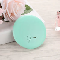 Pastel green Pocket LED Makeup Mirror with a modern design, perfect for travel and everyday beauty routines.