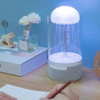 Mechanical Jellyfish Colorful Bluetooth Speaker glowing on a desk, featuring a jellyfish design and soft ambient lighting.