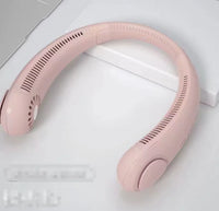 Compact pink Mini Bladeless Neck Fan Outdoor resting on a surface, highlighting its portable, quiet, and rechargeable features for daily use.